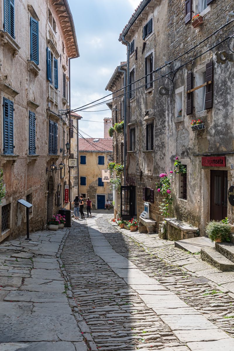 Stone houses along a narrow street in Grožnjan, Istria
