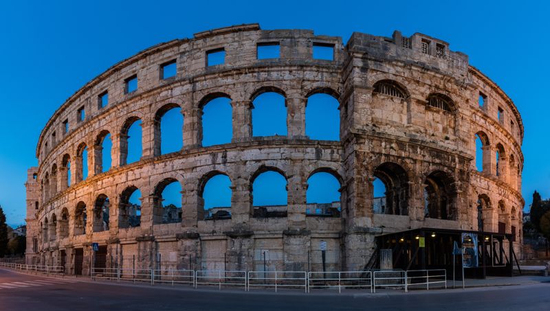 The Roman amphitheatre in Pula, with the city around it