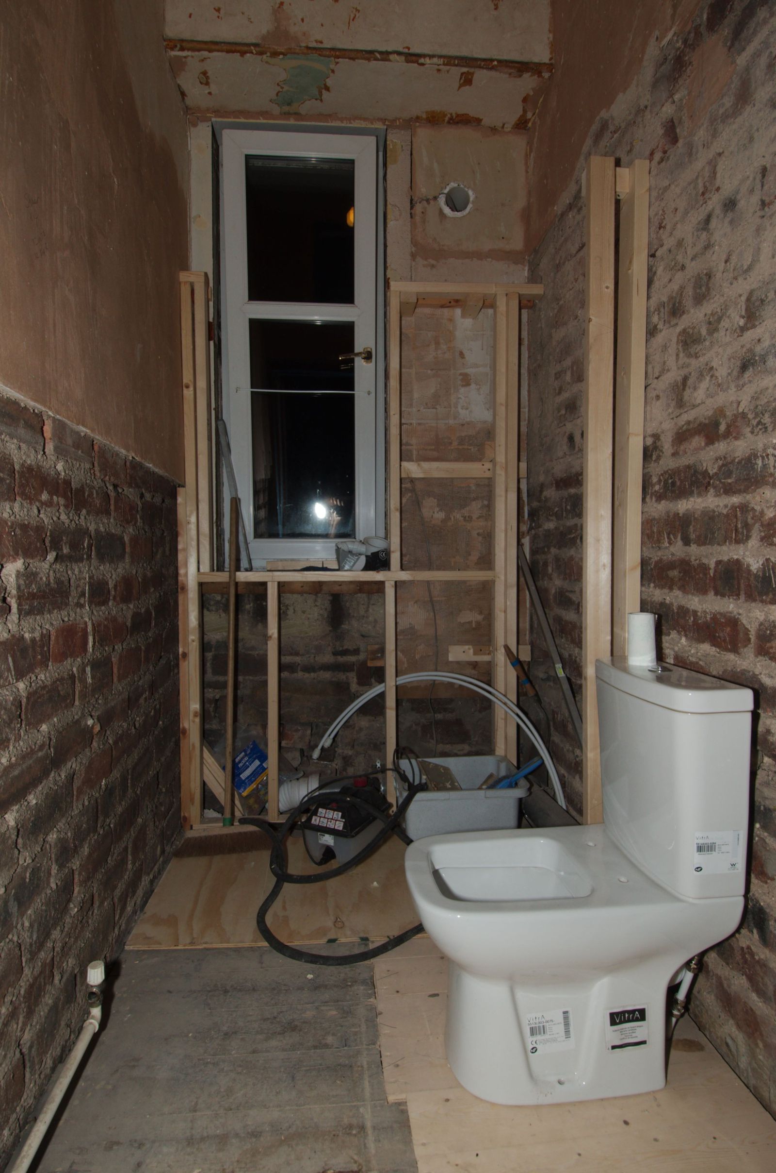 Bathroom stripped to the walls with new water pipes and connections installed